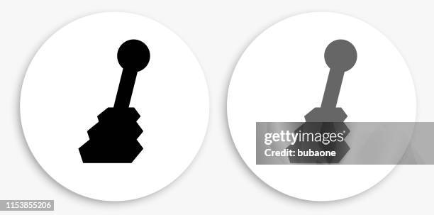 shift stick black and white round icon - gear shift white background stock illustrations