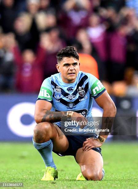 Latrell Mitchell of the Blues is dejected after his team loses game one of the 2019 State of Origin series between the Queensland Maroons and the New...