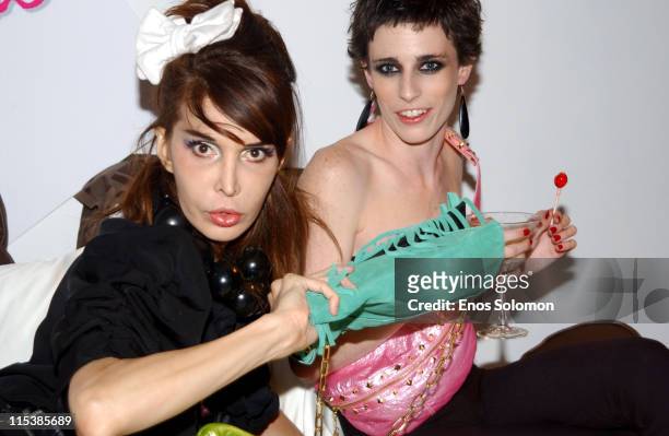 Sophia Lamar and model with handbags by Patricia Field Spring 2006