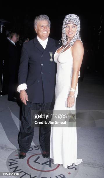 Tony Curtis and Jill Vandenberg during 1999 Vanity Fair Oscar Party - Arrivals at Morton's Restaurant in Los Angeles, California, United States.