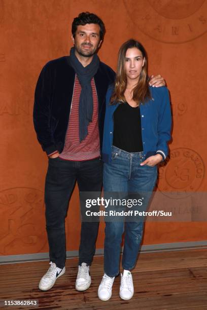 Antoine Benneteau and his companion Charlotte Gabris attend the 2019 French Tennis Open - Day Eleven at Roland Garros on June 05, 2019 in Paris,...