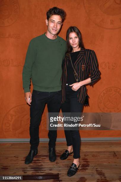 Model Francisco Lachowski and his wife Jessiann Gravel Beland attend the 2019 French Tennis Open - Day Eleven at Roland Garros on June 05, 2019 in...
