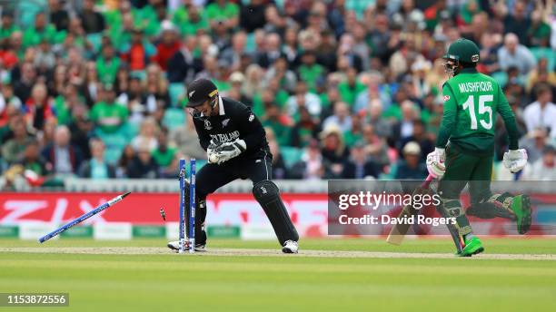 Tom Latham, the New Zealand wicketkeeper runs out Mushfiqur Rahim during the Group Stage match of the ICC Cricket World Cup 2019 between Bangladesh...