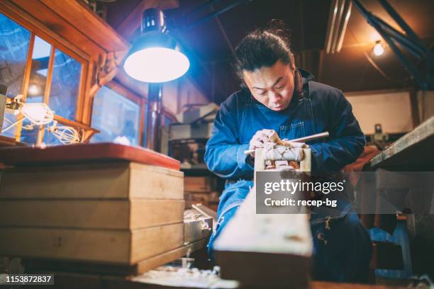 asian man making craft from wood - spatula stock pictures, royalty-free photos & images
