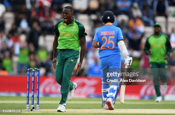 Kagiso Rabada of South Africa celebrates the wicket of Shikhar Dhawan of India during the Group Stage match of the ICC Cricket World Cup 2019 between...