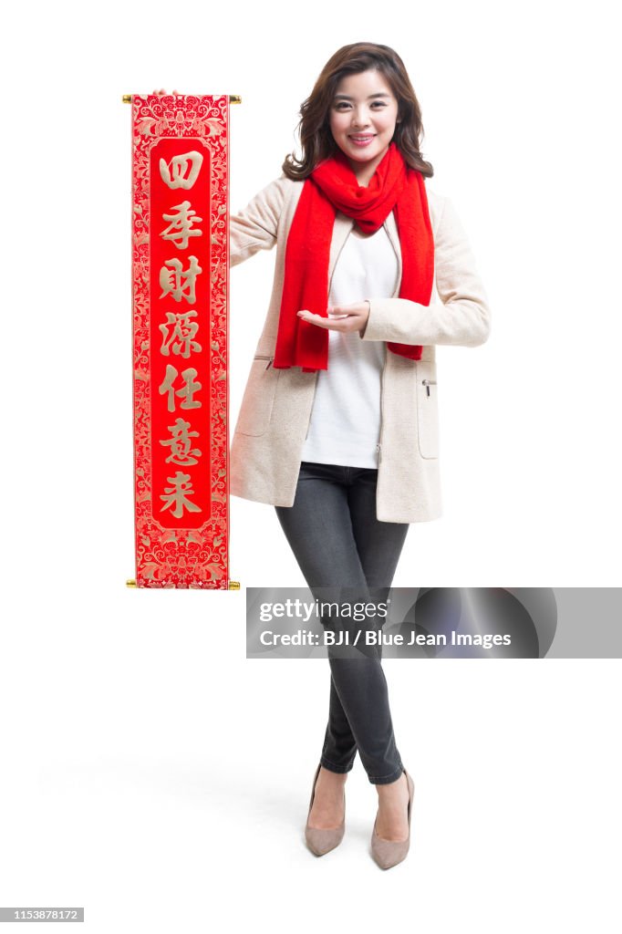 Happy young woman celebrating Chinese New Year