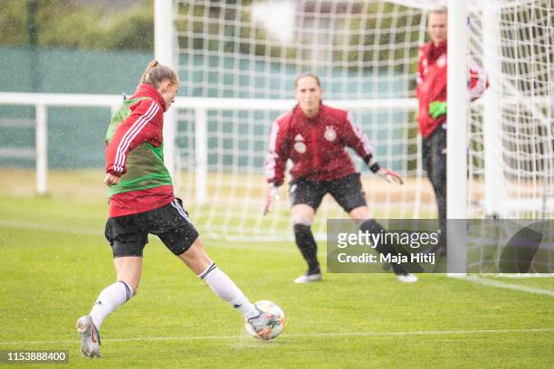 Lea Schueller controls the ball during a training session of the German women's national football team on June 05, 2019 in Bruz, France. Germany will...