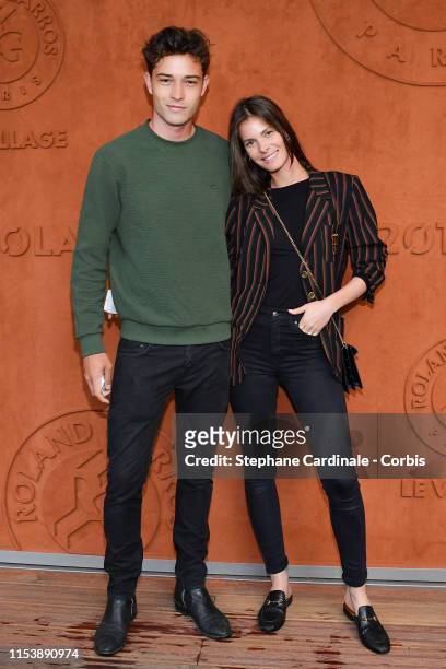 Model Francisco Lachowski and his wife Jessiann Gravel Beland attend the 2019 French Tennis Open - Day Eleven at Roland Garros on June 05, 2019 in...