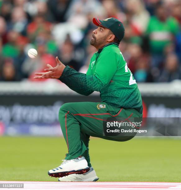 Tamin Iqbal Khan of Bangladesh catches Martin Guptill during the Group Stage match of the ICC Cricket World Cup 2019 between Bangladesh and New...