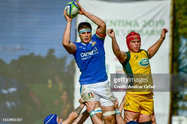 Semisi Tupou of Australia and Andrea Chianucci of Italy rise to claim the lineout during a first round match between Australia U20 and Italy U20 as...