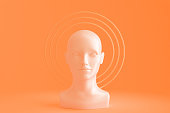 A woman's head with Golden circles around it depicting an aura. Concept art on the topic of religion. 3D illustration