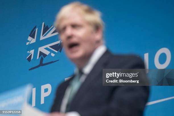 The Conservative Party logo sits on a backdrop as Boris Johnson, former U.K. Foreign secretary, delivers a speech at a Conservative Party leadership...