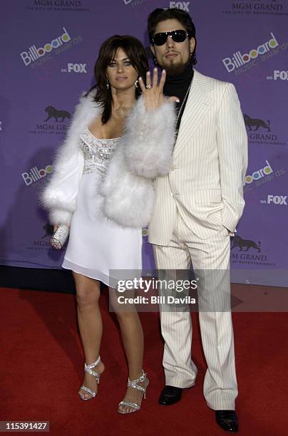 Carmen Electra and Dave Navarro during The 2003 Billboard Music Awards - Outside Arrivals at MGM Grand Garden Arena in Las Vegas, Nevada, United...