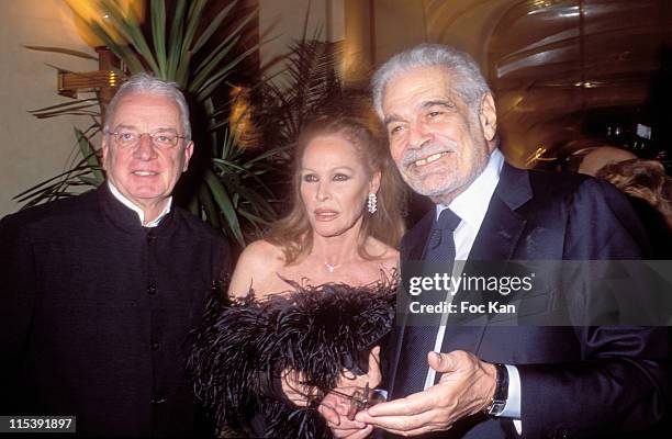 Just Jaeckin, Ursula Andress and Omar Sharif during Gala Dinner for the Bests Awards - at Royal Monceau Hotel in Paris, France.
