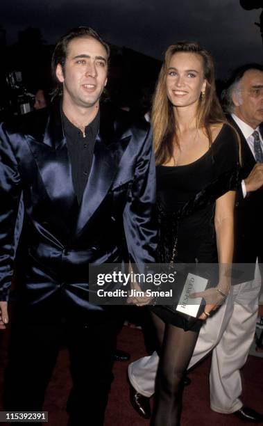Nicolas Cage and Lisa Stothard during "Wild At Heart" Los Angeles Premiere" at Cineplex Odeon Theater in Universal City, California, United States.
