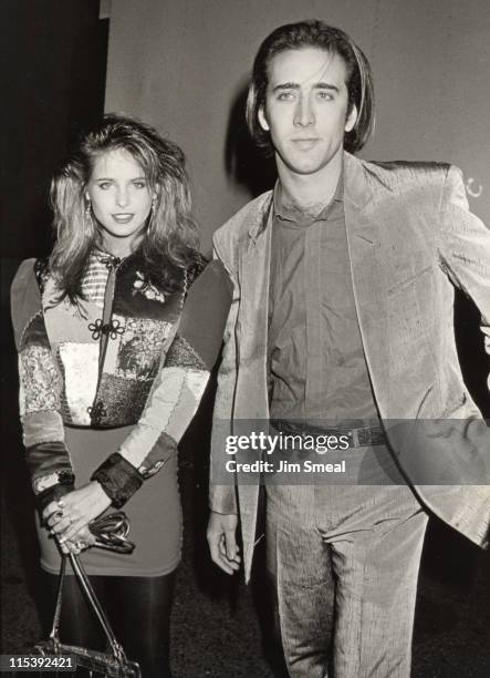 Nicolas Cage and Amy Dolent during Premiere of "And God Created Woman" at 20th Century Fox Studios in Los Angeles, California, United States.