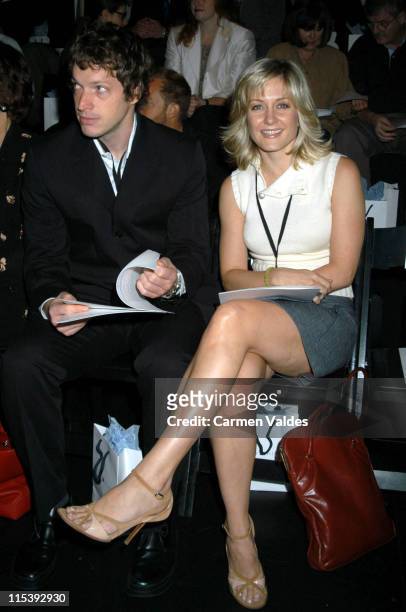 Amy Carlson & Guest during Mercedes-Benz Fashion Week Spring Collections 2003 Tommy Hilfiger - Front Row at Bryant Park in New York City, New York,...