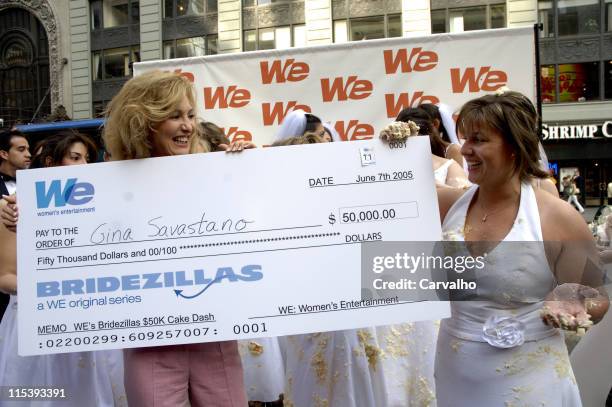 Kim Martin, General Manager of WE: Women's Entertainment, presents the $50,000 check to winner Gina Savastano of Manhattan