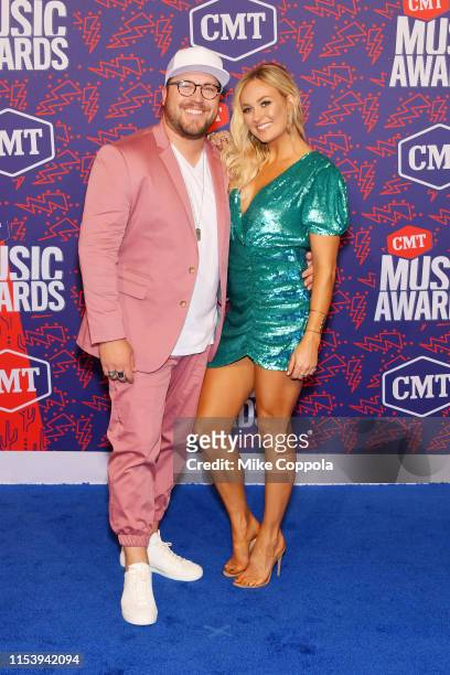 Mitchell Tenpenny and Meghan Patrick attend the 2019 CMT Music Award at Bridgestone Arena on June 05, 2019 in Nashville, Tennessee.