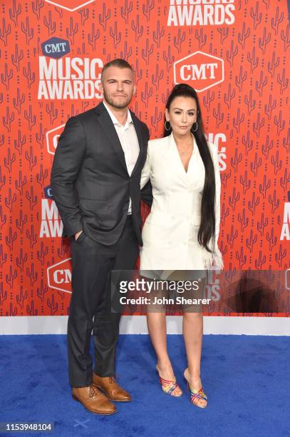Zack Clayton Carpinello and JWoww attend the 2019 CMT Music Awards at Bridgestone Arena on June 05, 2019 in Nashville, Tennessee.