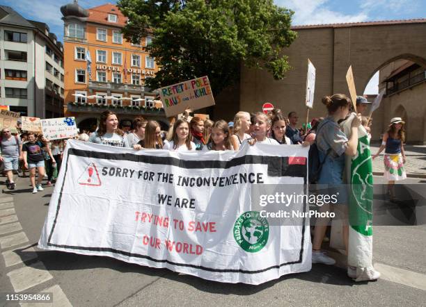 Banner reading &quot; Sorry for the inconvenience We are Trying to save our World &quot;. After the heat records in Germany on 5 July 2019 severel...