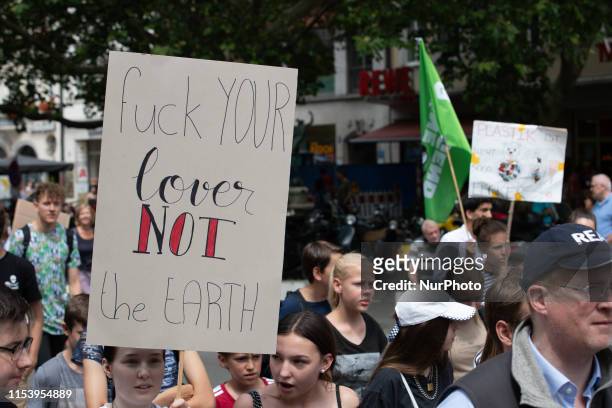 Sign reading &quot; Fuck yur lover not the earth &quot;. After the heat records in Germany on 5 July 2019 severel hundreds gathered again fr...