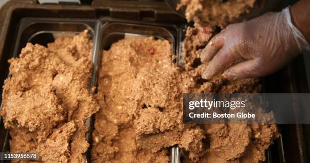 Soy-based vegan Impossible Foods beef is mixed with other ingredients before being prepared as meatballs at Clover Food Labs in Cambridge, MA on June...