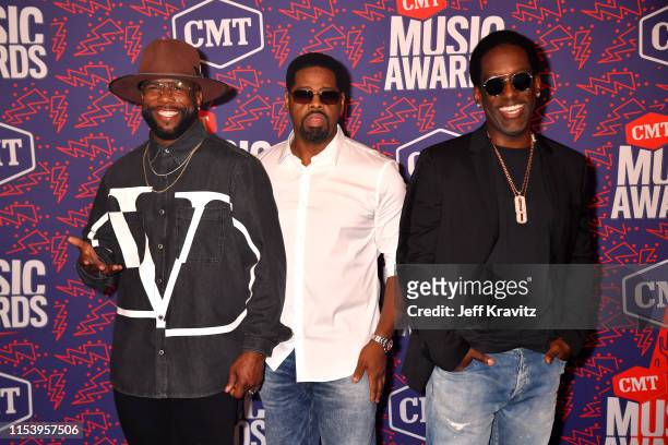 Wanya Morris, Nathan Morris and Shawn Stockman of Boyz II Men attend the 2019 CMT Music Awards at Bridgestone Arena on June 05, 2019 in Nashville,...