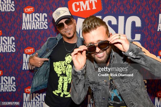 Chris Lucas and Preston Brust of LOCASH attend the 2019 CMT Music Awards at Bridgestone Arena on June 05, 2019 in Nashville, Tennessee.