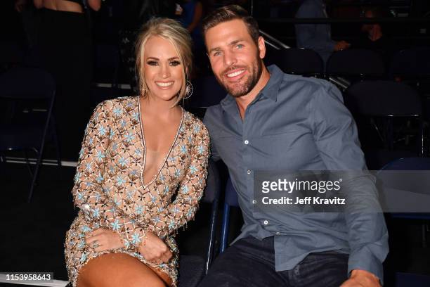 Carrie Underwood and Mike Fisher attend the 2019 CMT Music Awards at Bridgestone Arena on June 05, 2019 in Nashville, Tennessee.