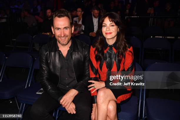 Peter White and Michelle Monaghan attend the 2019 CMT Music Awards at Bridgestone Arena on June 05, 2019 in Nashville, Tennessee.