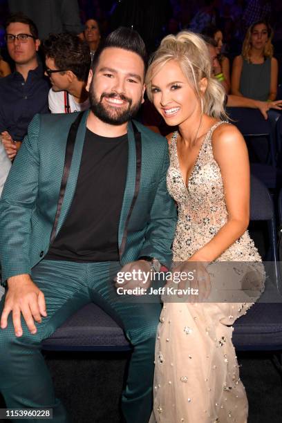 Shay Mooney and Hannah Billingsley attend the 2019 CMT Music Awards at Bridgestone Arena on June 05, 2019 in Nashville, Tennessee.