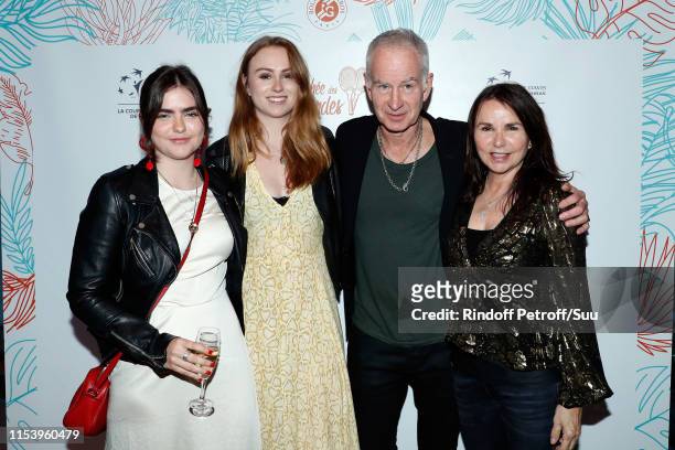 Anna McEnroe, Ava McEnroe, John McEnroe, Patty Smith attend the "Legends Of Tennis" Dinner as part of 2019 French Tennis Open at on June 05, 2019 in...