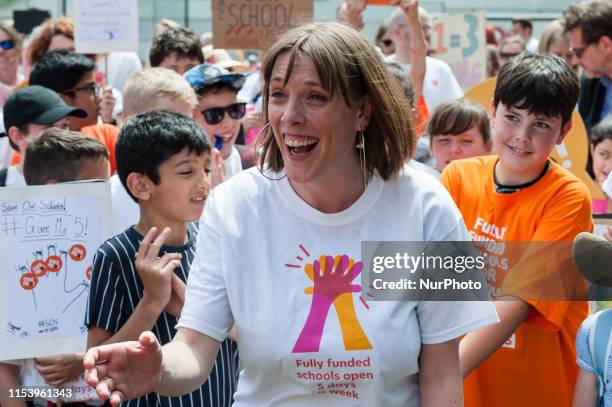 Labour MP Jess Phillips and her 10-year-old son Danny join hundreds of school children, their parents and campaigners from across the country in...