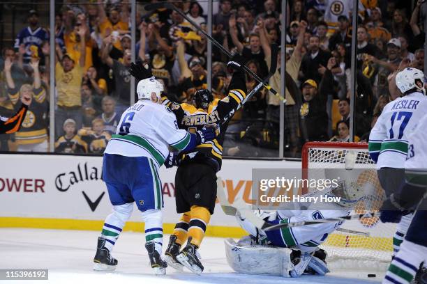Rich Peverley of the Boston Bruins celebrates after scoring a goal in the second period against Roberto Luongo of the Vancouver Canucks during Game...