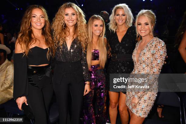 Jennifer Wayne, Hannah Mulholland, Lindsay Ell. Naomi Cooke and Carrie Underwood2 attend the 2019 CMT Music Awards at Bridgestone Arena on June 05,...