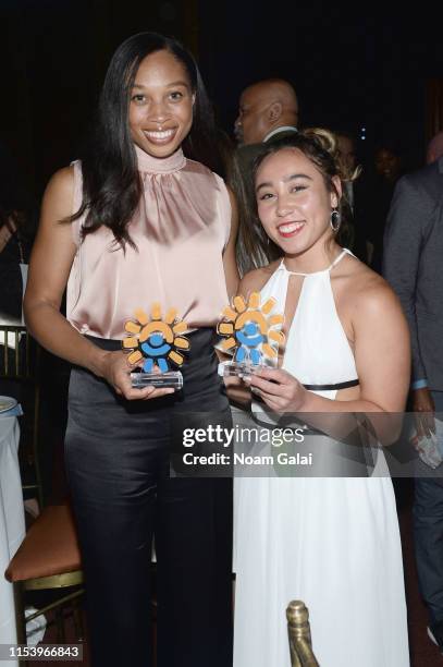 Allyson Felix and Katelyn Ohashi pose with their awards at the Children's Health Fund Annual Benefit 2019 on June 05, 2019 in New York City.