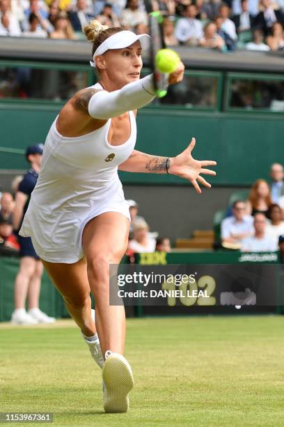 Slovenia's Polona Hercog returns against US player Cori Gauff during their women's singles third round match on the fifth day of the 2019 Wimbledon...