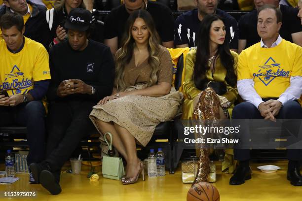 Jay-Z and Beyonce attend Game Three of the 2019 NBA Finals between the Golden State Warriors and the Toronto Raptors at ORACLE Arena on June 05, 2019...