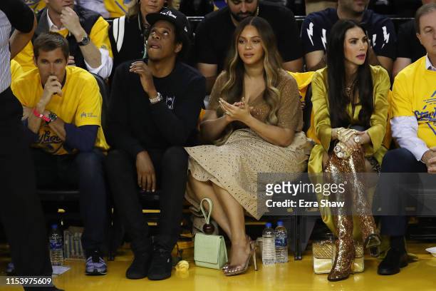 Jay-Z and Beyonce attend Game Three of the 2019 NBA Finals between the Golden State Warriors and the Toronto Raptors at ORACLE Arena on June 05, 2019...
