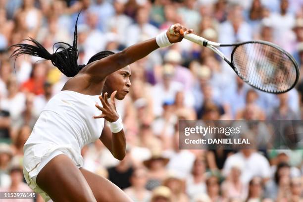 Player Cori Gauff serves against Slovenia's Polona Hercog during their women's singles third round match on the fifth day of the 2019 Wimbledon...