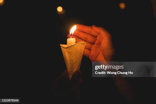 30th anniversary of candlelight vigil for june 4 massacre in hong kong - memorial candle stock pictures, royalty-free photos & images