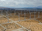Aerial view of wind turbines generating electricity in Palm Springs desert