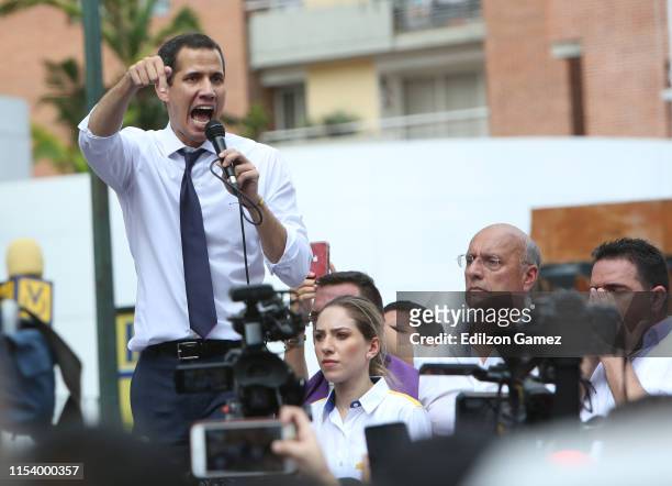 Opposition leader and president of the National Assembly Juan Guaidó speaks at the end of a demonstration near the DGCIM as part of the 208th...