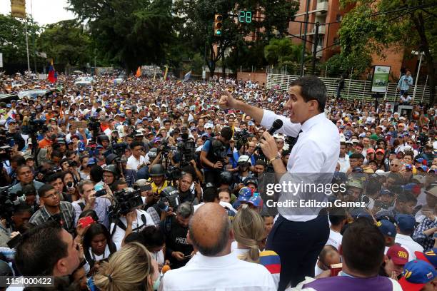 Opposition leader and president of the National Assembly Juan Guaidó speaks at the end of a demonstration near the DGCIM as part of the 208th...