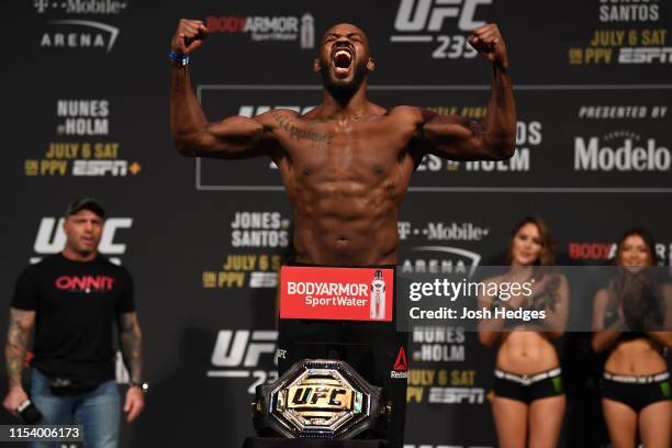 Jon Jones poses on the scale during the UFC 235 weigh-in at T-Mobile Arena on July 5, 2019 in Las Vegas, Nevada.