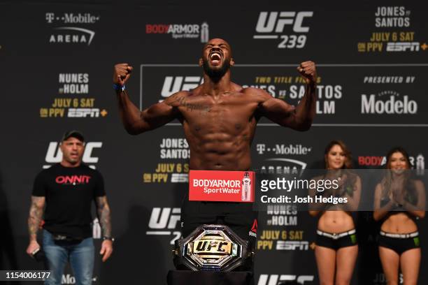 Jon Jones poses on the scale during the UFC 235 weigh-in at T-Mobile Arena on July 5, 2019 in Las Vegas, Nevada.