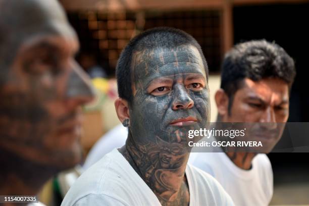 An ex member of the MS-13 gang is pictured at Santa Ana prison, 60 km northwest of San Salvador, on May 21, 2019. - Former members of Salvadoran...