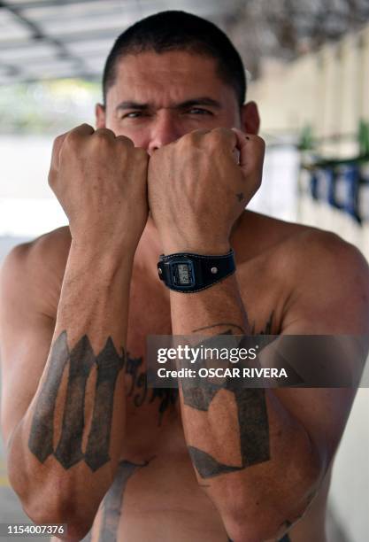 Former MS-13 gang leader Valmis Mejia a.k.a. 'el Bambi', is pictured at Santa Ana prison, 60 km northwest of San Salvador, on May 21, 2019. - Former...