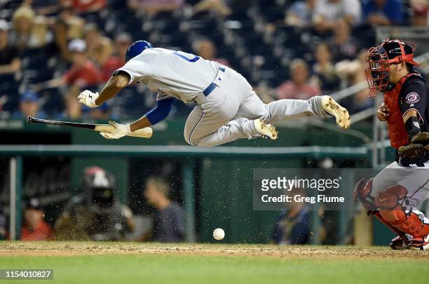 Terrance Gore of the Kansas City Royals is hit by a pitch in the 11th inning against the Washington Nationals at Nationals Park on July 5, 2019 in...